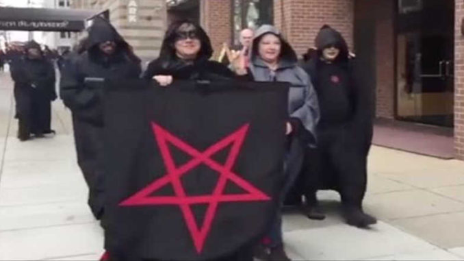 Satanists march against Trump.